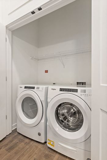 A washer and dryer in a laundry room